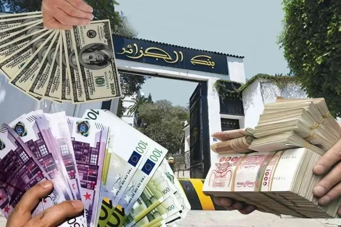 a hand holding money and stacks of paper money