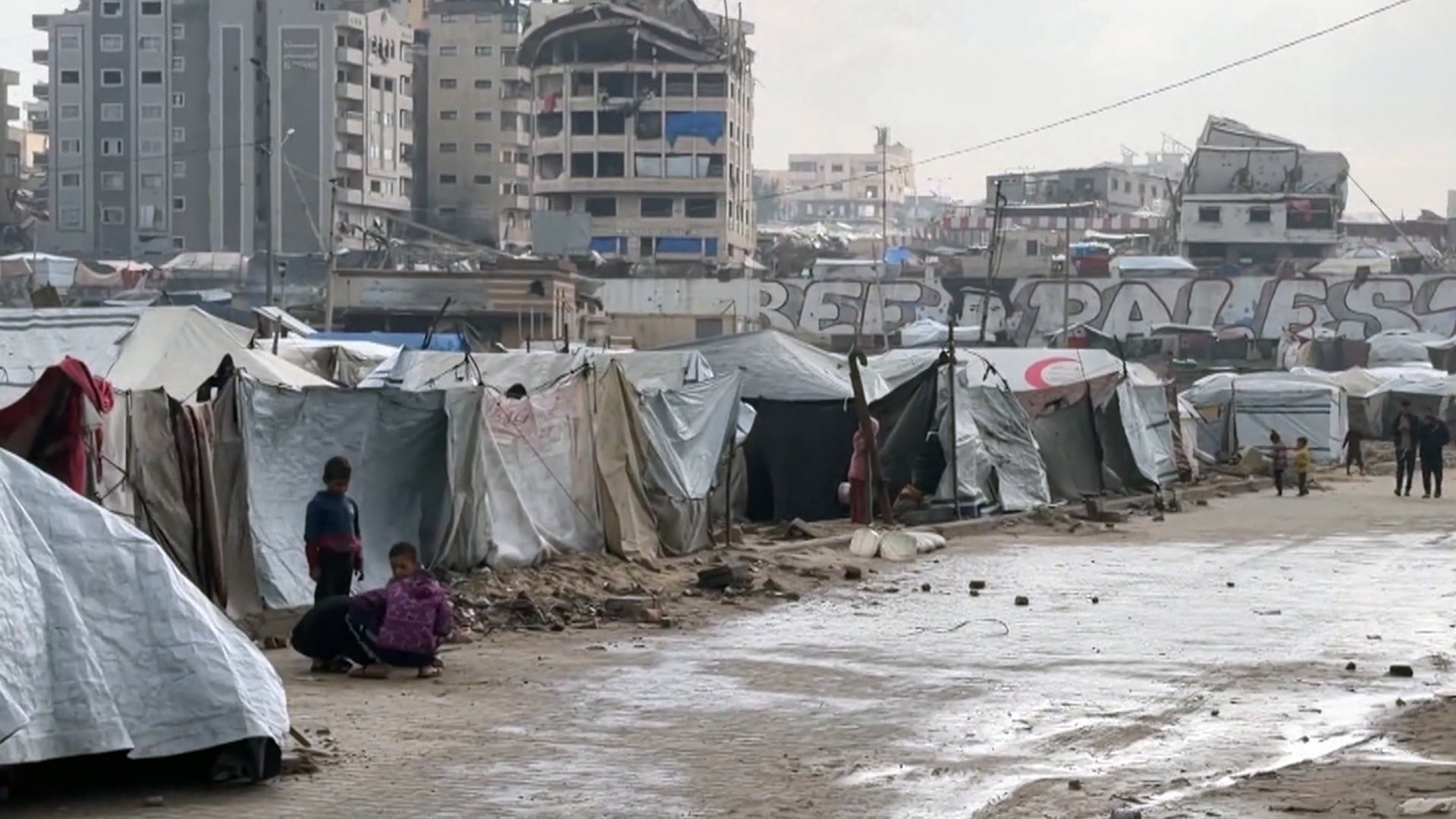 Israeli Airstrikes Hit Southern Gaza Amid Flood Crisis