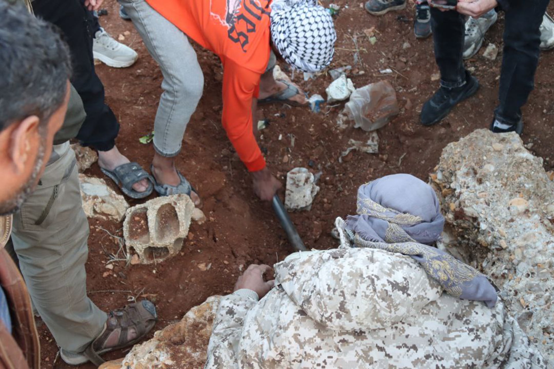 Mass Graves Unearthed in Homs, Syria