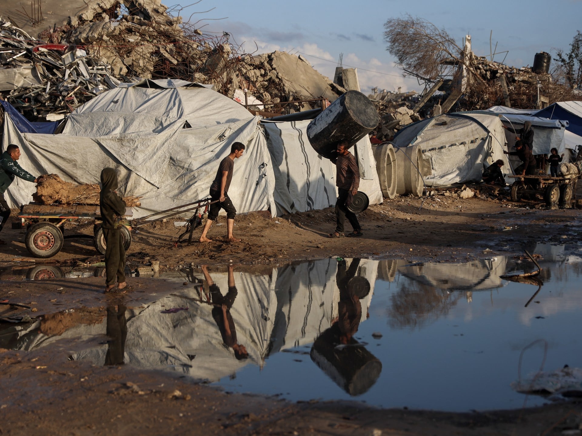 Gaza: Casualties Mount Amidst Storms & Ceasefire Violations