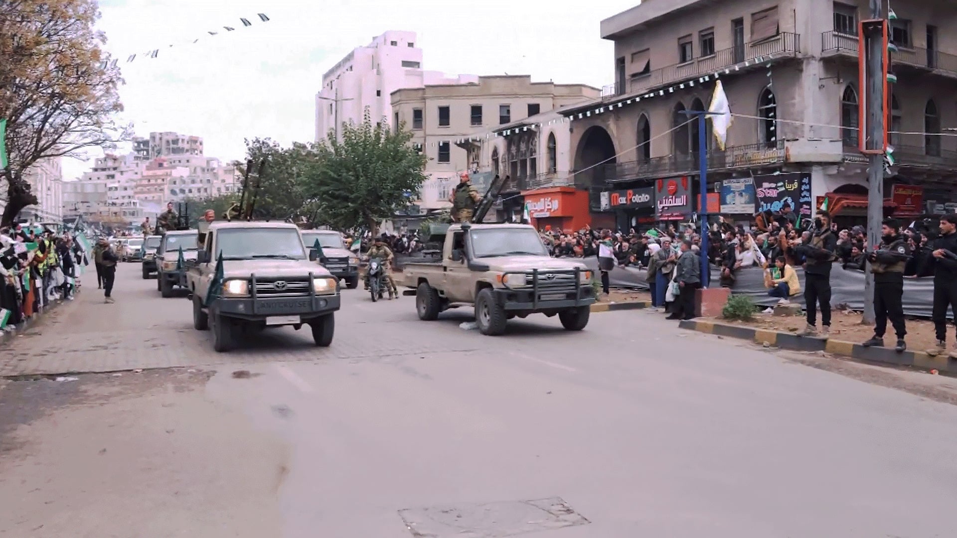 Military Parade Marks Anniversary of Assad Regime’s Fall in Homs