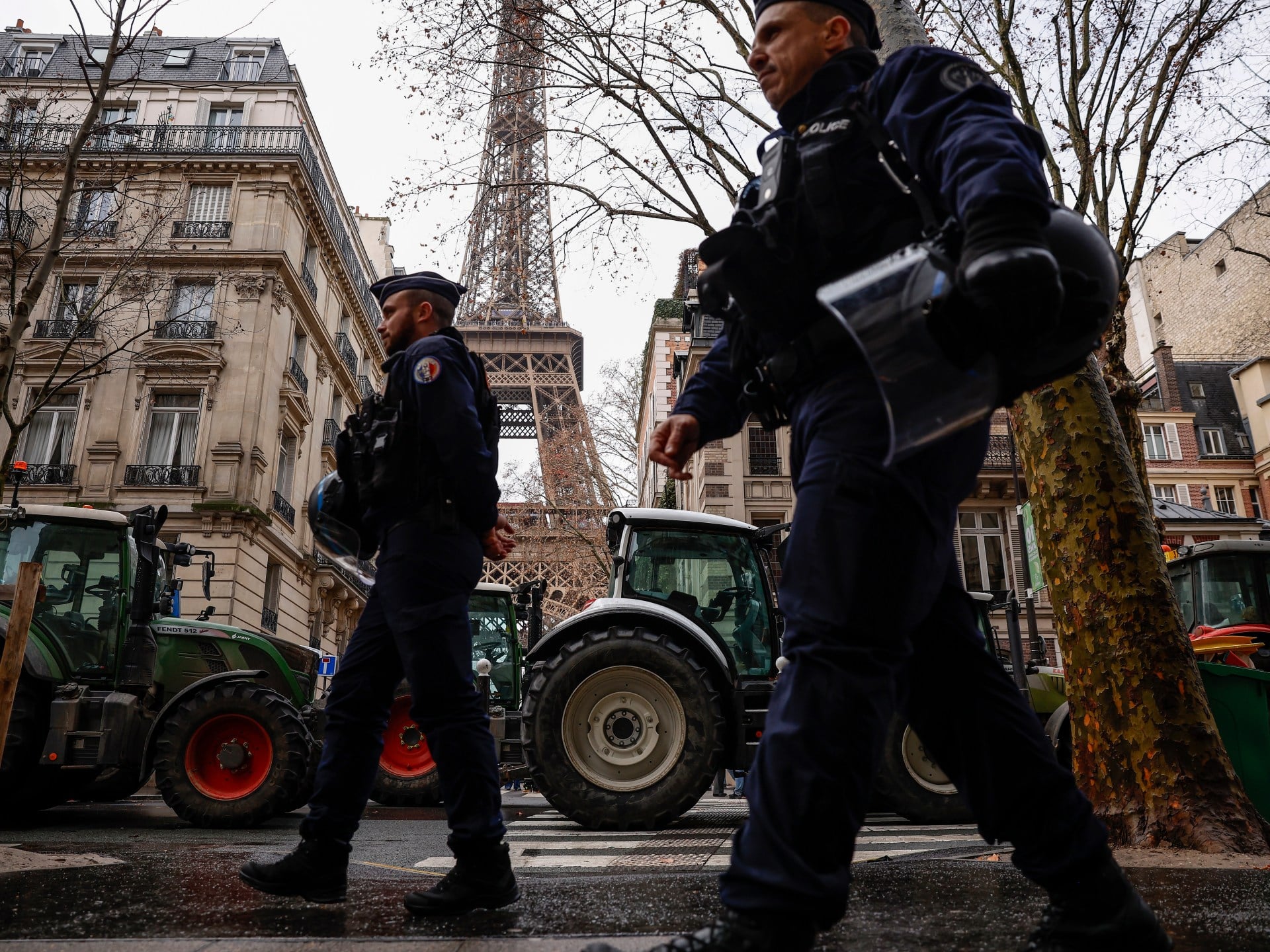 French Farmers Block Eiffel Tower with Tractors in Trade Protest