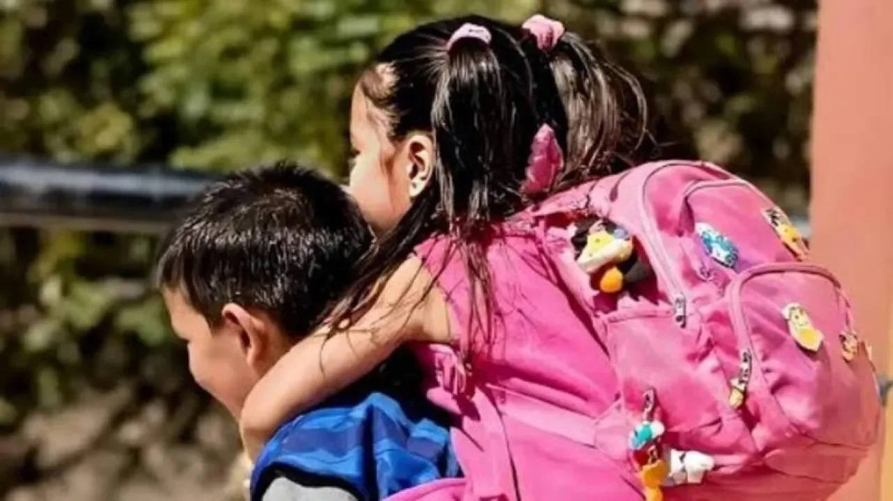 Viral Video of Child Carrying Sister Sparks National Admiration